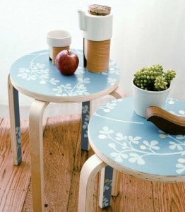 Perk up a plain table or stool with salvaged wallpaper scraps.