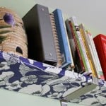 How to decoupage fabric onto shelves