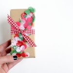 If you tend to do things a little last minute like me, here's an idea for embellishing wrapped gifts. This DIY confetti wrap is so fun and colorful!