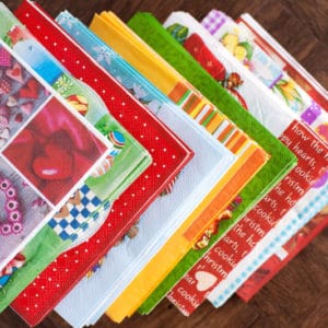 It's a lot easier to decoupage napkins to surfaces than you think! Learn how to do it with Mod Podge - tips, tricks, and a video included.