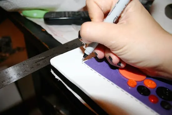 Making dashes around the edge of the purple paper