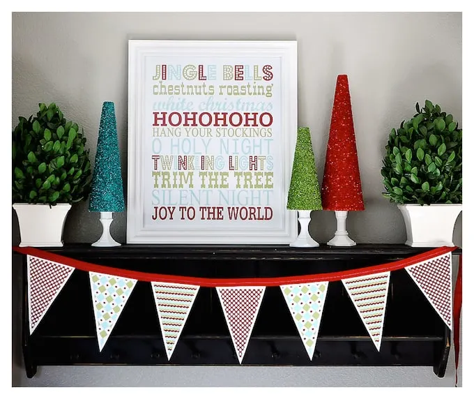 Decorate your home for the holidays with these free Christmas printables - subway art and a banner. They are so cute and colorful!