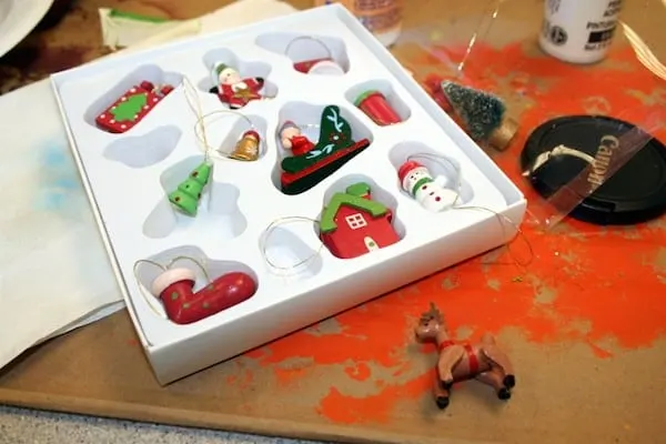 Box of miniature Christmas ornaments