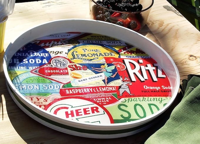 This DIY lazy susan is so cool - it was created from a planter saucer! Head to the hardware store and collect some vintage images for this fun craft.