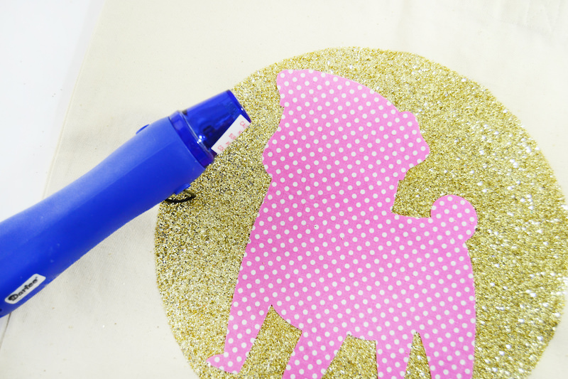 Attach your applique with a hot glue gun