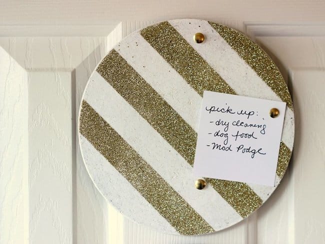 Use glitter and Mod Podge to turn IKEA trivets into DIY cork boards! Customize with the glitter and paint colors of your choice.