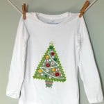 Make this DIY Christmas shirt using Mod Podge photo transfer medium! It's a perfect option to make a cute wardrobe for your kids this holiday season.