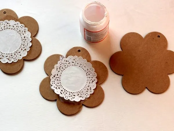 Doily Mod Podged to the top of a chipboard shape