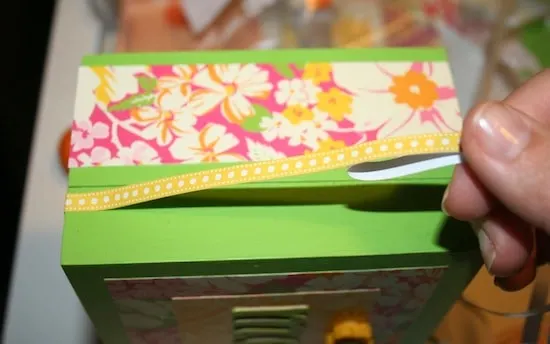 Decorate this DIY jewelry box with your favorite papers and Mod Podge; it makes the perfect mothers day craft for the mom who has everything!