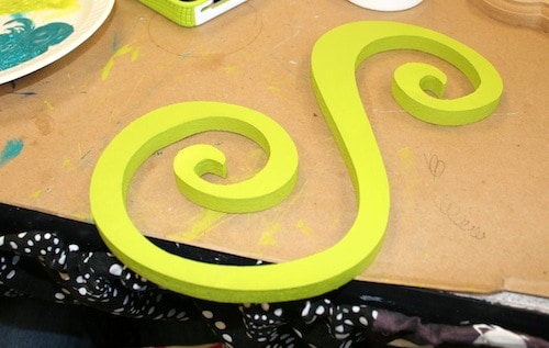 Wood letter S painted with yellow citron
