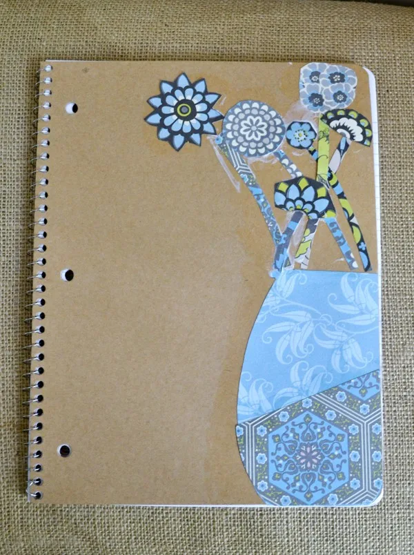 Notebook decorated with scrapbook paper