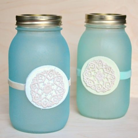 Use glass paint to create these mason jar lanterns with a faux beach glass theme. These look gorgeous with tea lights inside!
