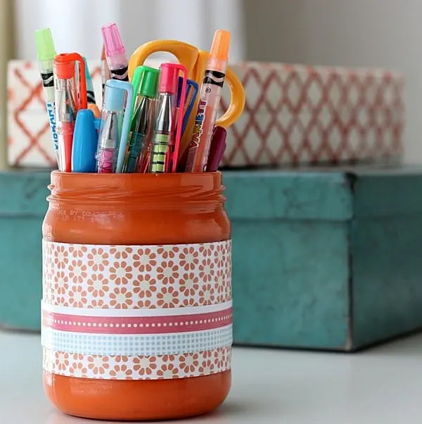 Learn how to make a DIY pencil cup holder out of a recycled glass jar