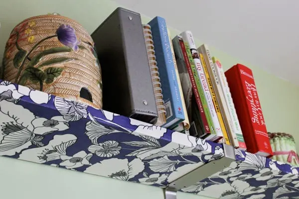 How to decoupage fabric onto shelves