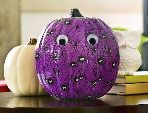 Learn how to decorate a pumpkin with Duck Tape! This is the easiest method, and both kids and adults can do it. Perfect for Halloween decor!