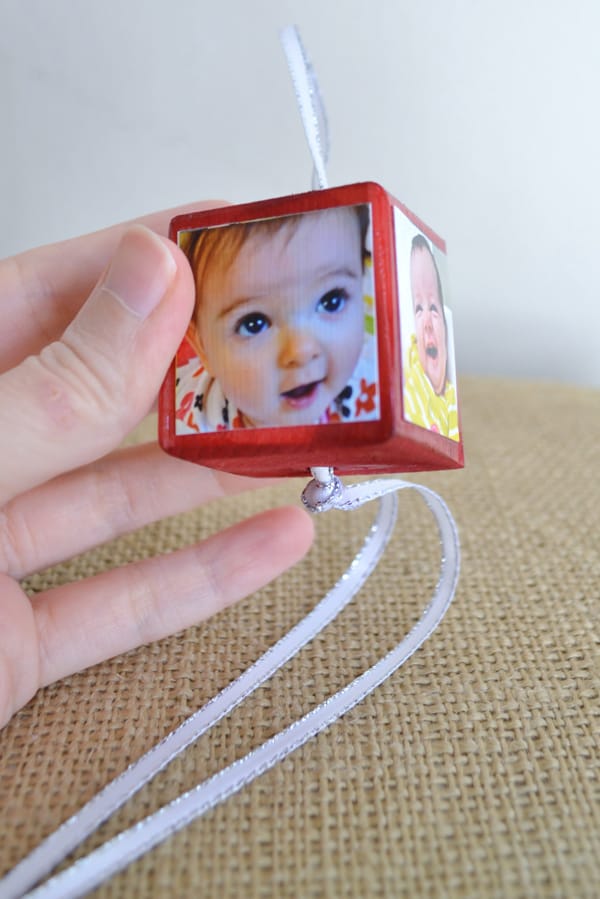 Create festive, personalized photo Christmas ornaments using your favorite pictures, wood blocks and Mod Podge. These make great gifts!