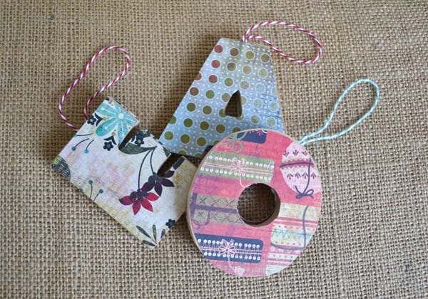 Use wood or paper mache to create these fun, personalized decoupage letter ornaments. They are easy to make with Mod Podge Gloss.