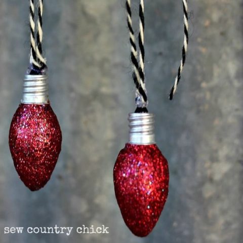 Don't throw away burned out night light bulbs - turn them into light bulb Christmas ornaments with Mod Podge and glitter!