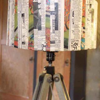 Finished decoupage lampshade on a tall lamp stand