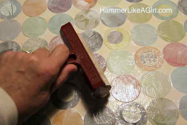 Brayer rolling over the top of wet Mod Podge