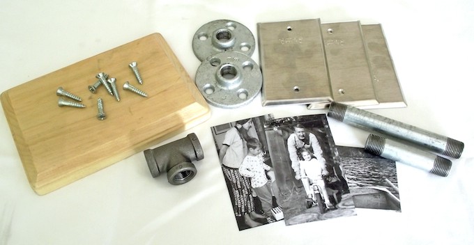 Wood plaque, metal part, pipe connectors, screws, and printed images