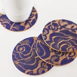 Scraps of lace can make a cool effect on the surface of these easy decoupage DIY coasters. Learn how to make them in a few easy steps.