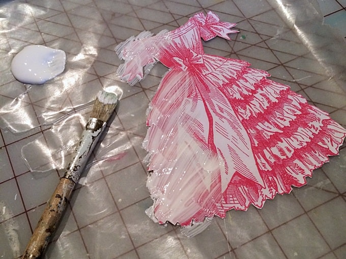 Applying photo transfer medium to a image of a dress