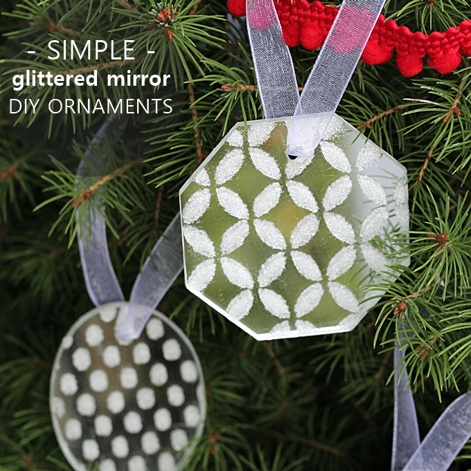 Use white glitter and Mod Podge Rocks stencils to make these pretty and simple DIY ornaments out of mirrors.