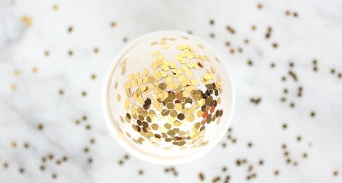 Turn plastic eggs into confetti Easter eggs with some Mod Podge and sparkle. This fun Easter craft is blingy and makes great decor!
