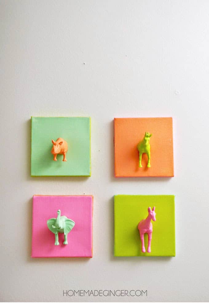 Cute DIY canvas art featuring plastic animals