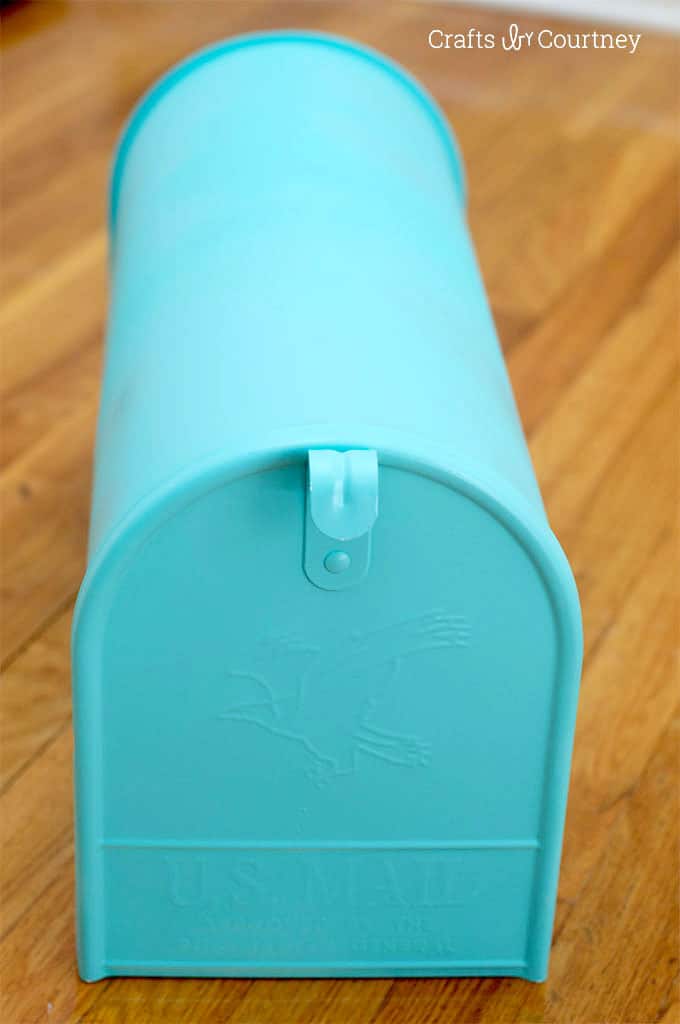 Mailbox spray painted with turquoise spray paint