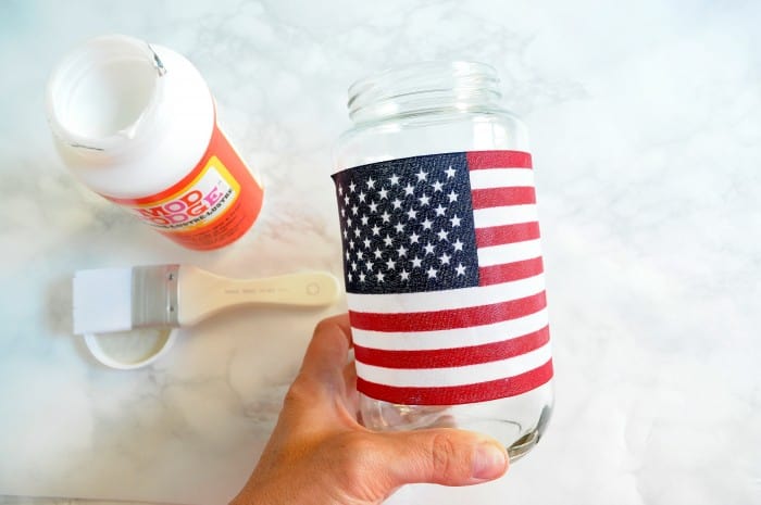 Seal your mason jar lanterns with Mod Podge
