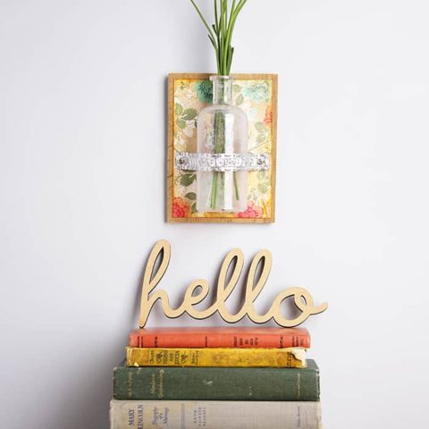 Display fresh flowers and herbs in your home this summer with an easy-to-make wall vase using a recycled bottle.