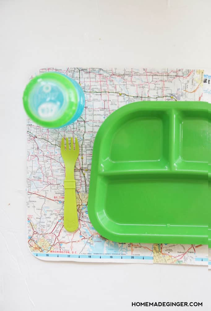 Does your little one make messes during meal time? Use Dishwasher Safe Mod Podge to make this unique DIY placemat from a map!