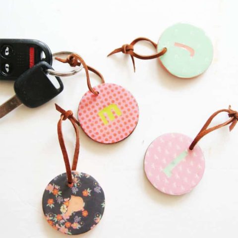 Learn how to make little personalized key chains that can be put on keys, a backpack or lunch box. You'll use Dimensional Magic to add shine!