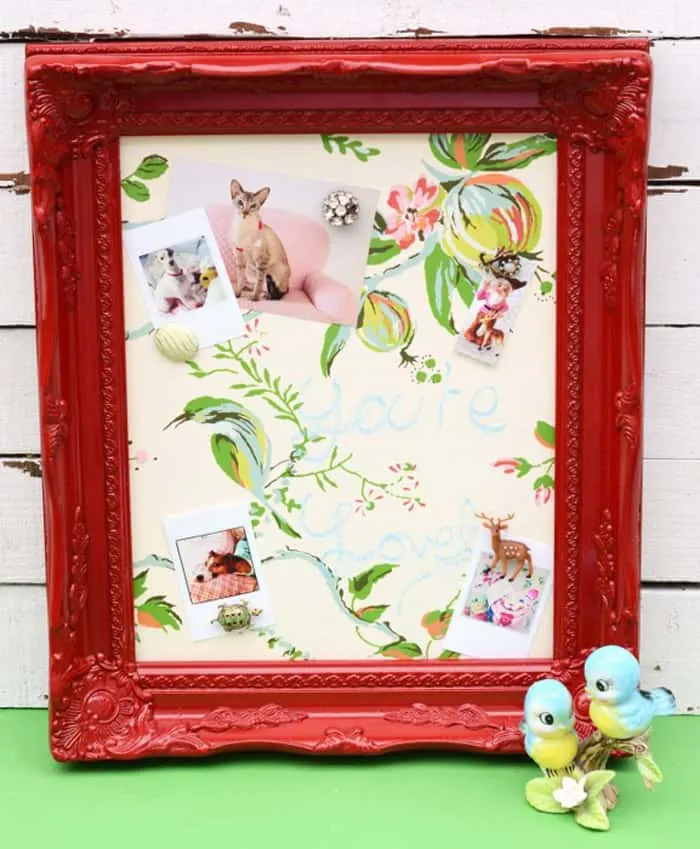 Use Mod Podge to make an easy vintage wallpaper covered magnetic chalkboard. This is perfect for keeping in the kitchen and organizing your family!