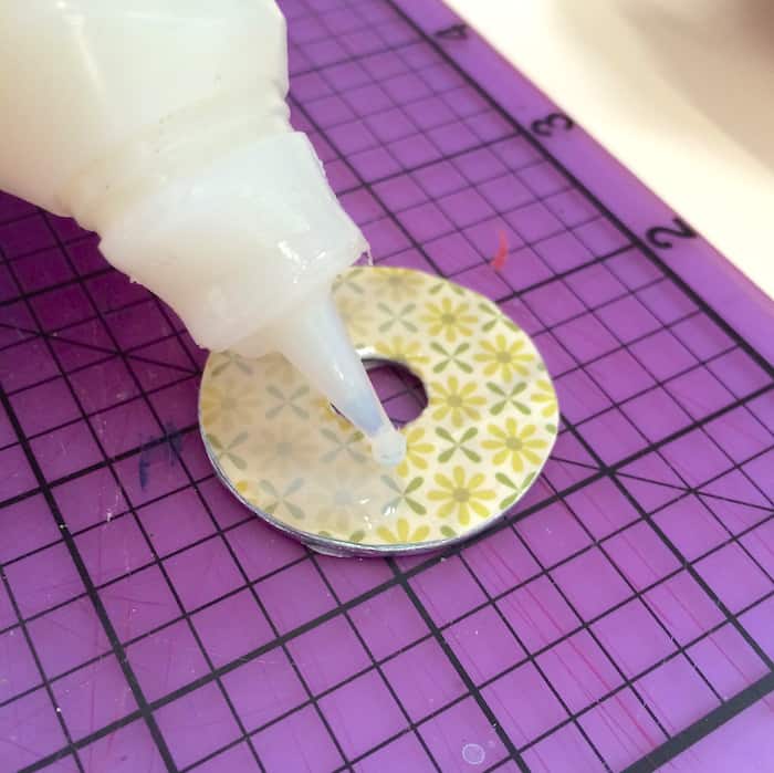 Add Mod Podge Dimensional Magic to the top of the washer jewelry