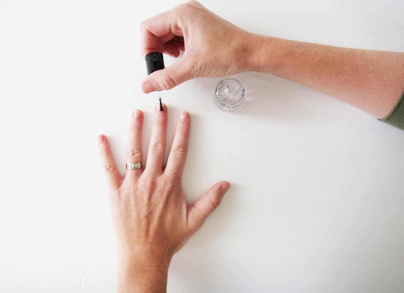 Painting a clear base coat onto nails