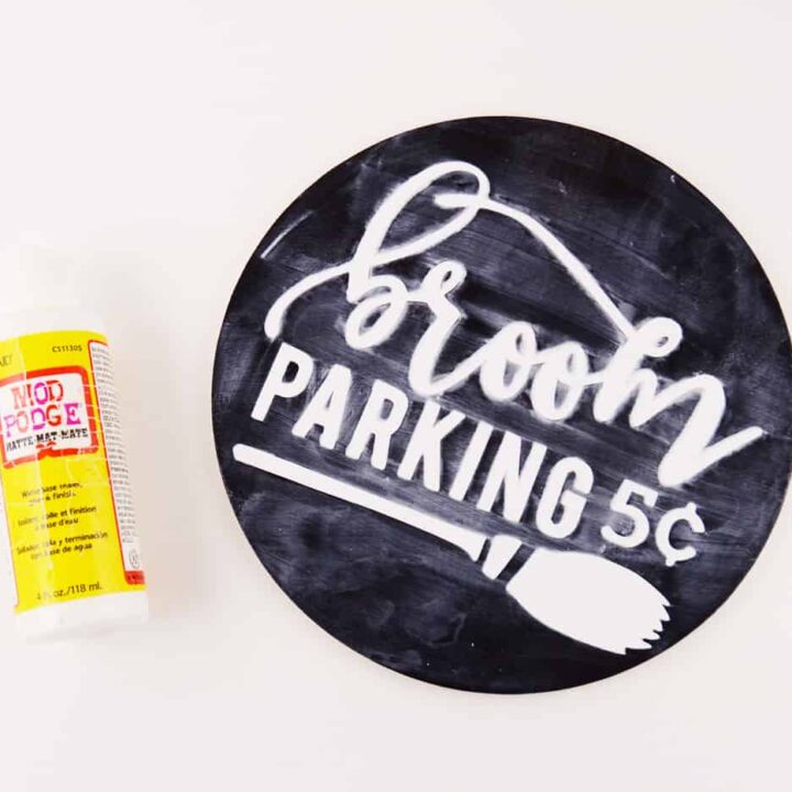 This small broom parking sign is such a cute Halloween craft - perfect for your front door if you're a renter, a door hanger or even a wreath adornment!