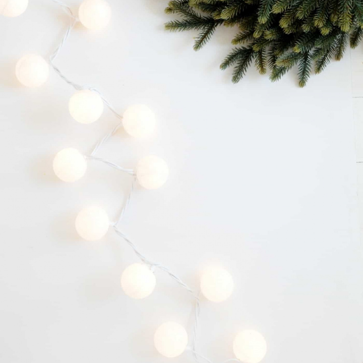 Are you ready to start decorating for Christmas yet? These DIY Christmas lights are easy to make and look like you have glittery snowballs decorating your home!