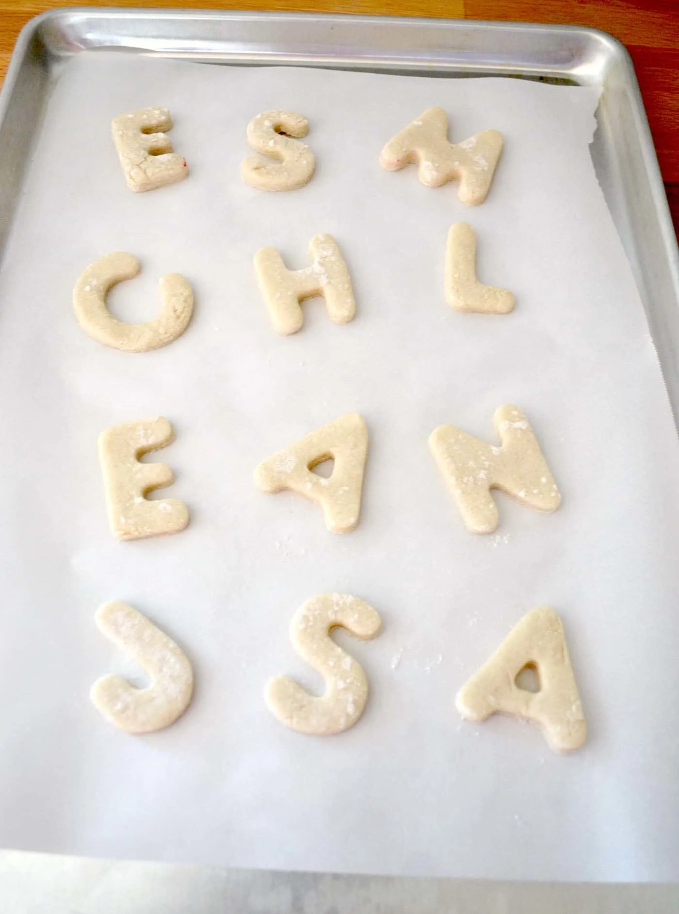 letters cut and laid out on a pan