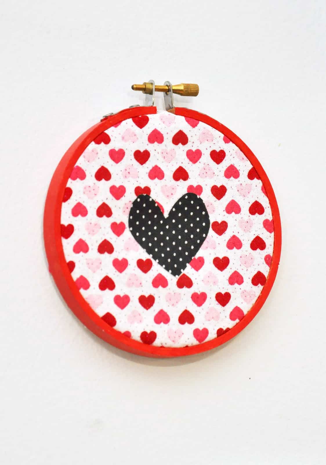 This little mixed fabric hoop valentine decor features a simple heart and is cute enough to stay up all year!