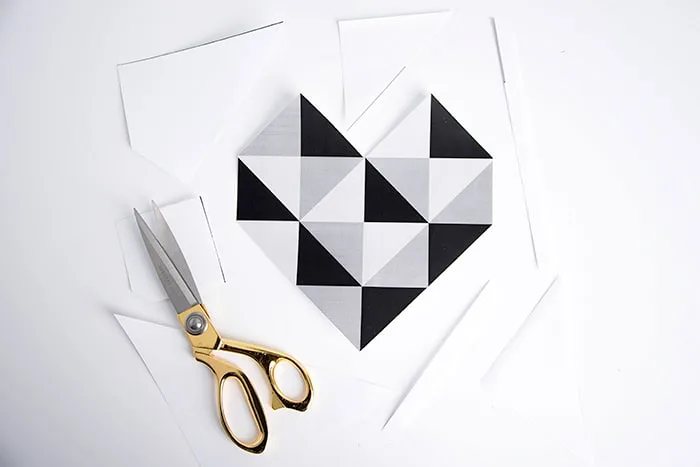 Cut out the geometric heart printable with scissors