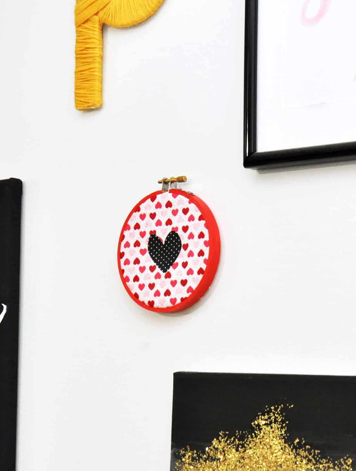 This little mixed fabric hoop valentine decor features a simple heart and is cute enough to stay up all year!