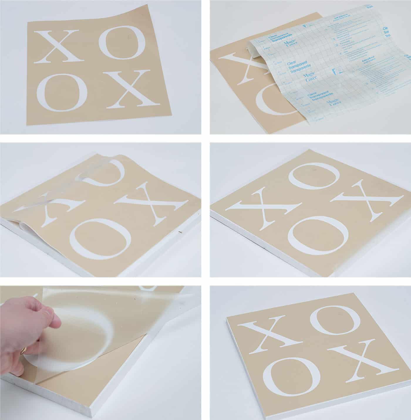 Adding an adhesive vinyl stencil to the square piece of wood using transfer paper