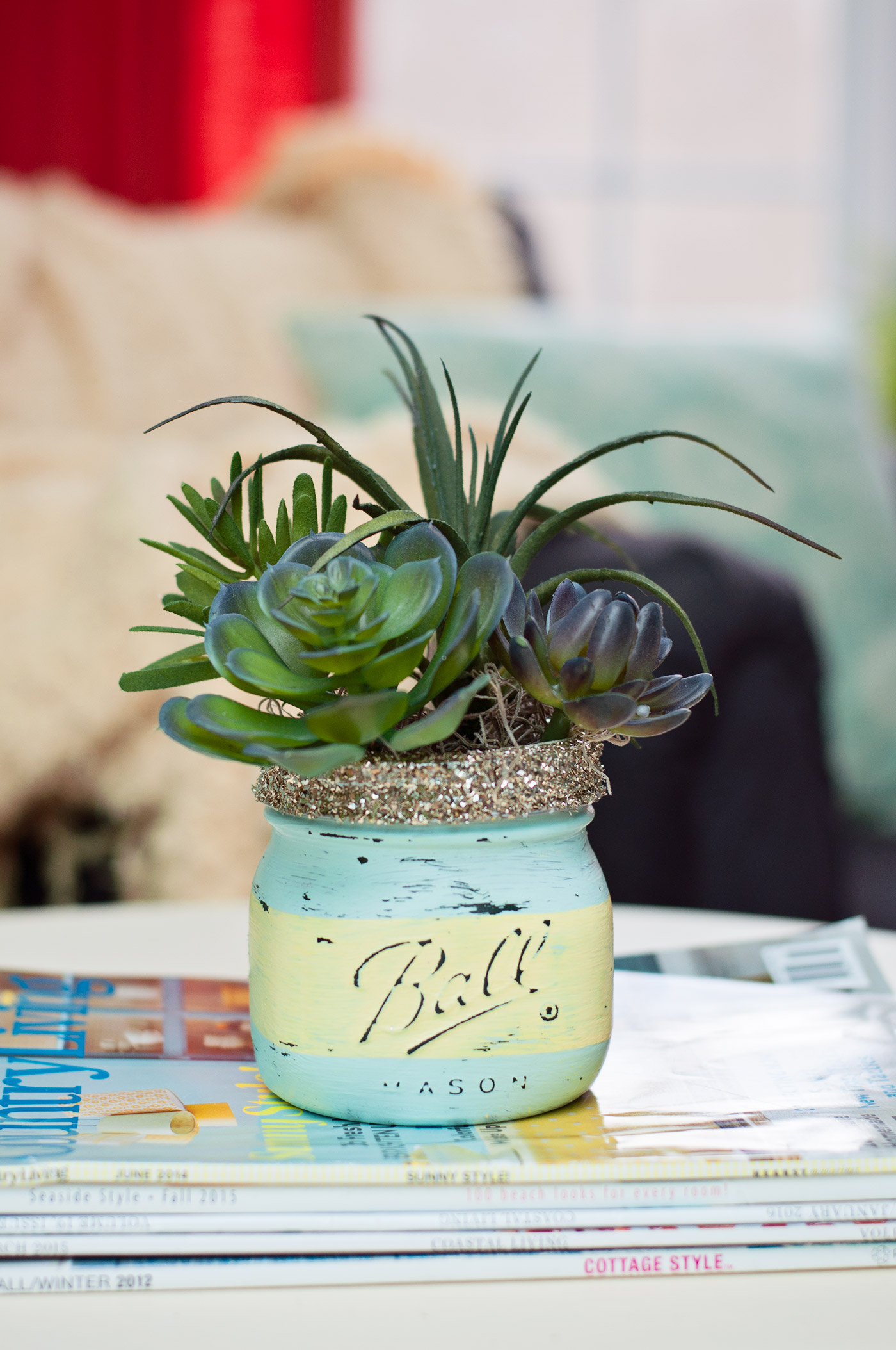 Use chalk paint and Mod Podge to create these gorgeous DIY mason jar succulent pots for spring. Perfect for a kitchen windowsill or a seasonal mantel!