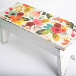 Decorate a wood step stool with paper and Mod Podge