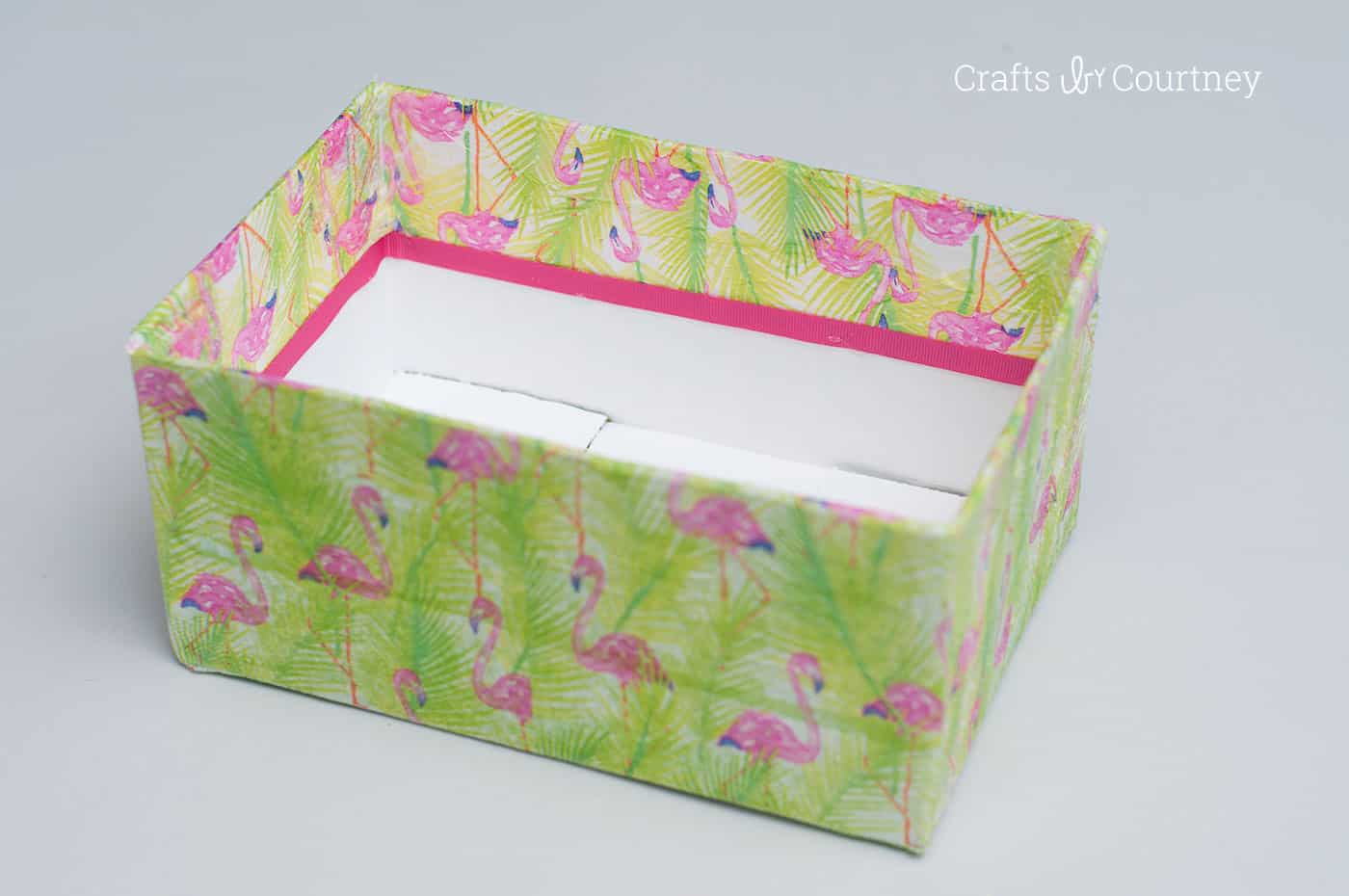 Use napkins from the dollar store along with decoupage medium in this unique box makeover project. It's so inexpensive and easy to do!