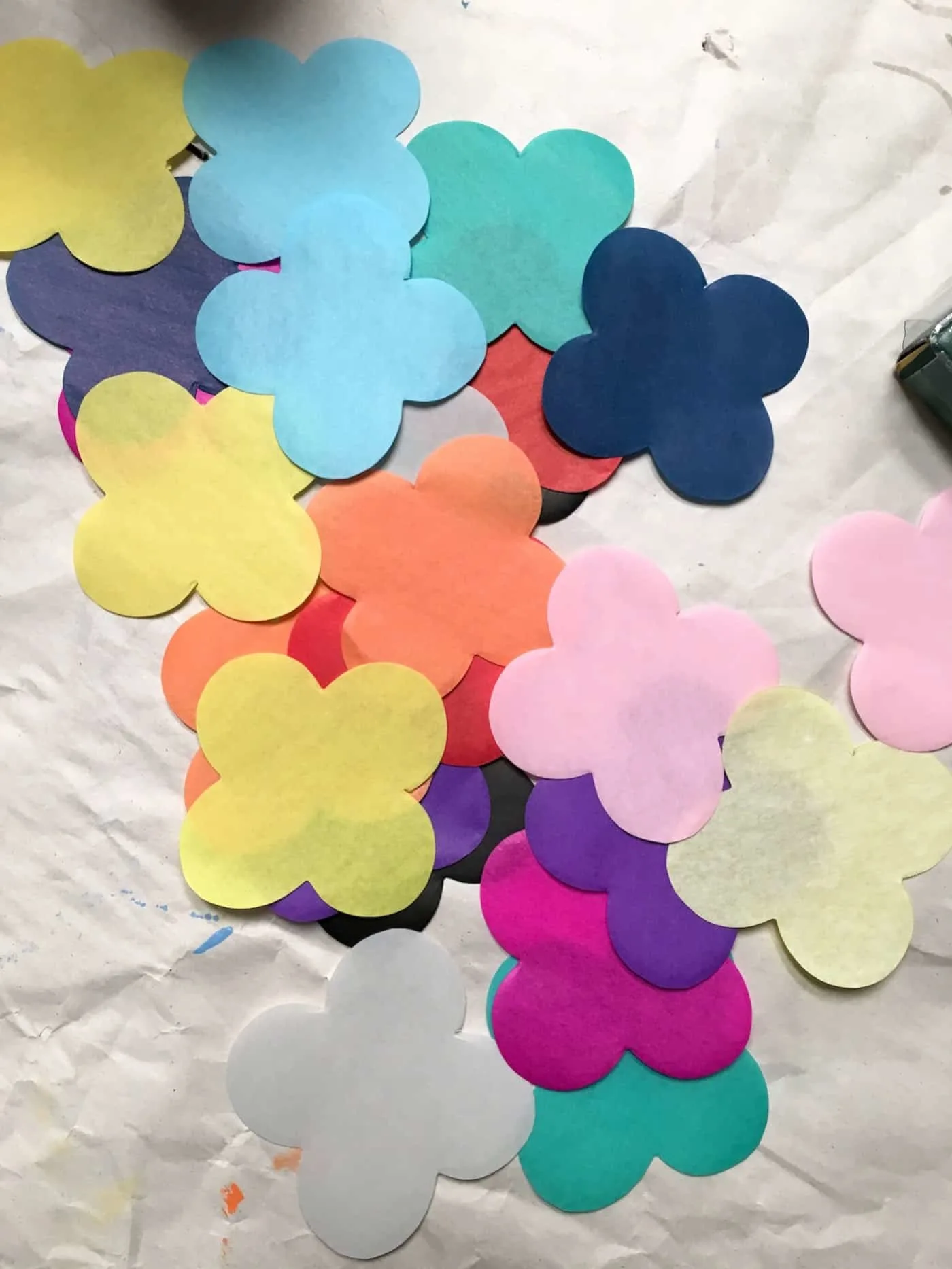 Tissue paper floral pieces in multiple colors