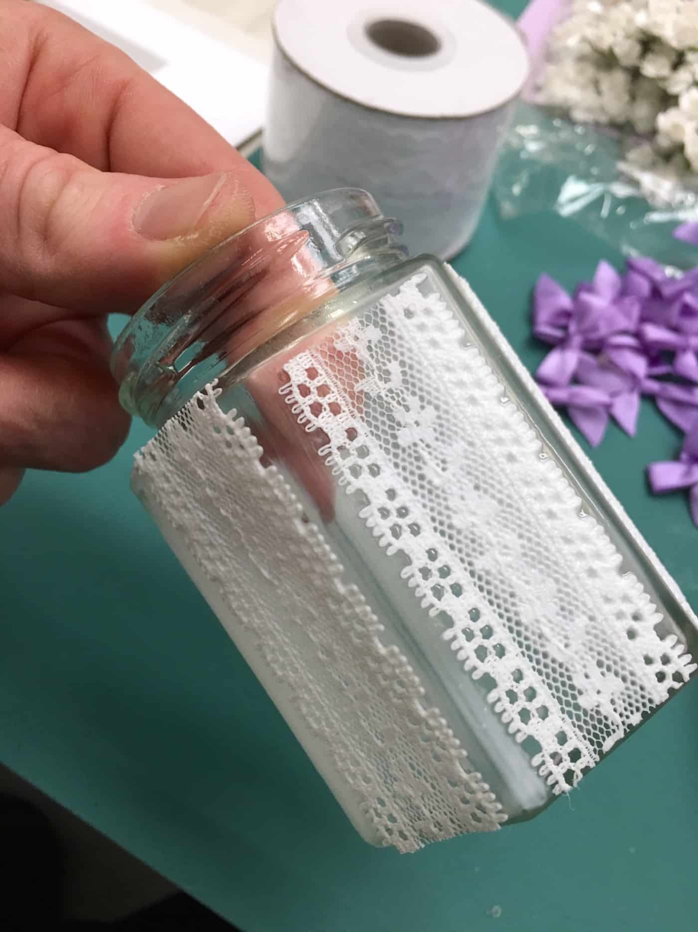 Applying lace to a mason jar